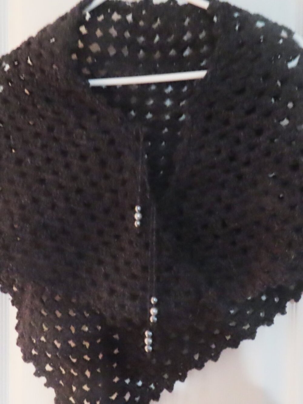 Hand crocheted black wool shawl